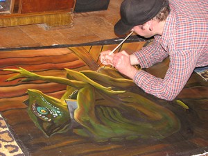 Craig working on his Lizard Man painting