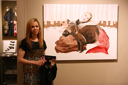 Amy Guidry with her painting, "Acceptance"