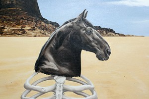 Detail shot of the finished horse head and desert cliffs